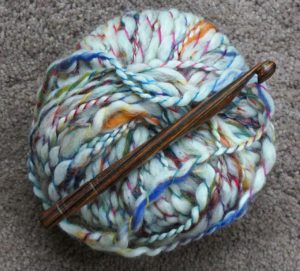 ball of multi colored yarn photo