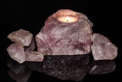 rose quartz candle and flame photo