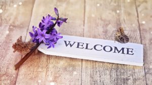 welcome sign with lavendar flowers image