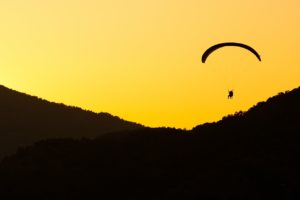 parachuting at sunset into higher consciousness
