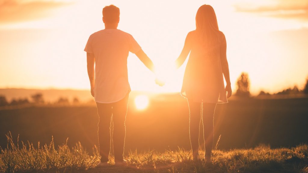frequencywriter.com ~ august 2020 energy update ~ man woman holding hands sunrise sunset