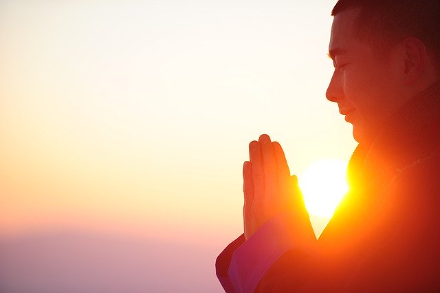 frequencywriter.com ~ october energy update 2020 ~ prayer meditation palms together sunset